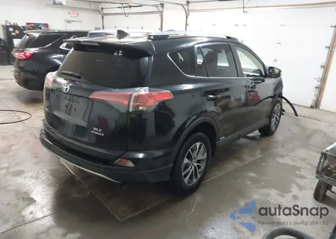 2018 Toyota Rav4 Hybrid Xle z USA, uszkodzony, nr VIN JTMRJREV3JD196636
